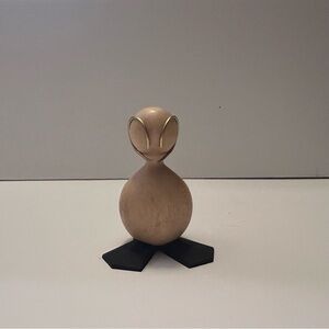 Gold Figurine with Black Base